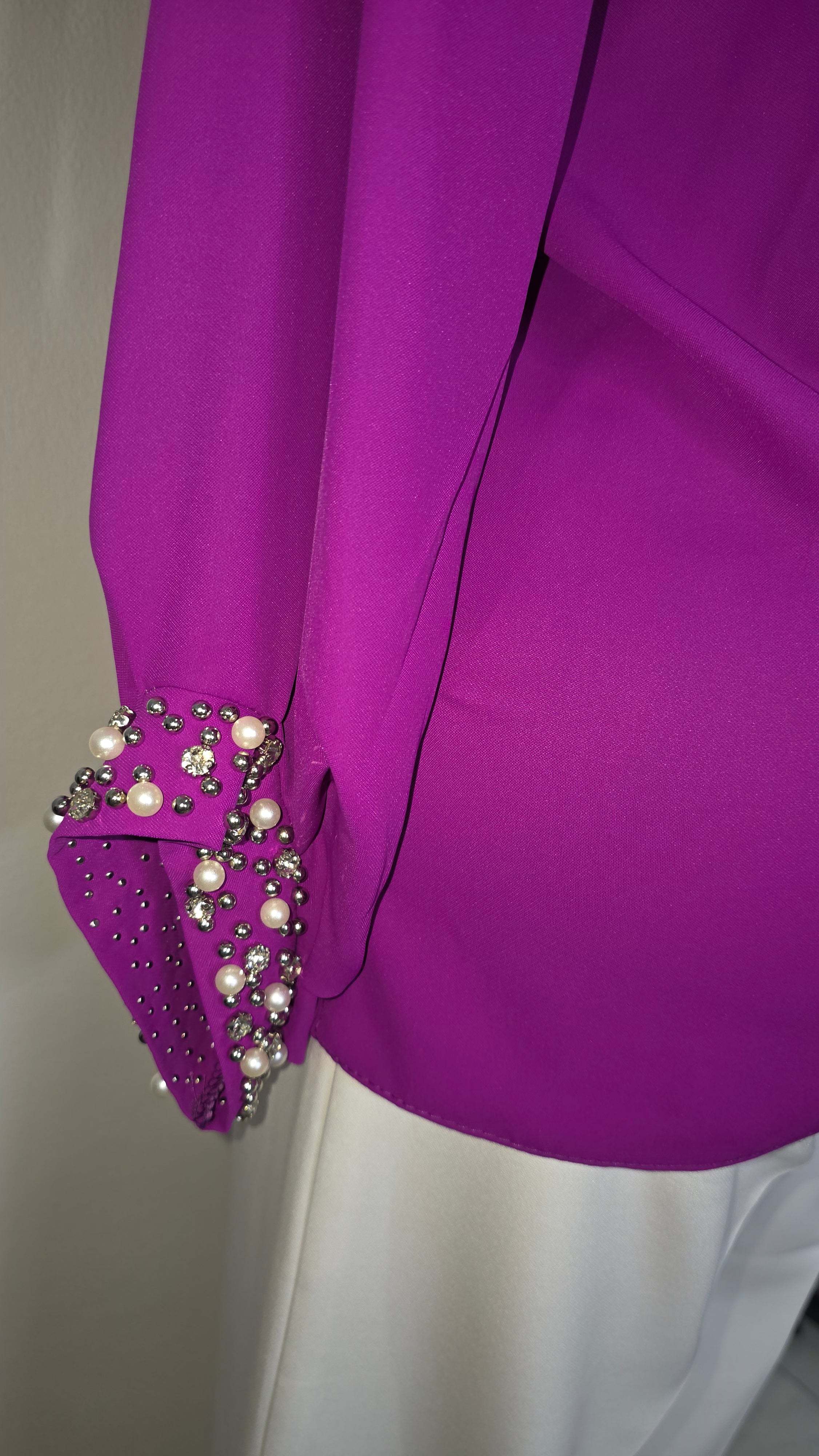 Purple blouse and white trouser set